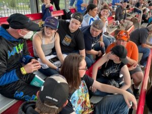 Butler Tech Students talking to Race car driver Adam Jones