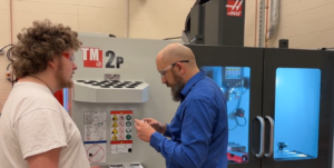 Hamilton student using Haas machine