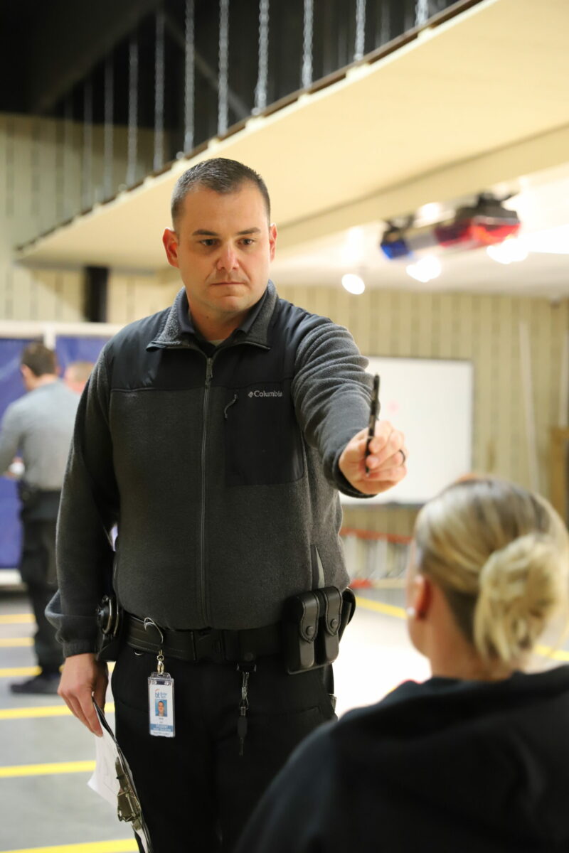 Basic Police Academy cadet administering sobriety testing in a simulation at Butler Tech