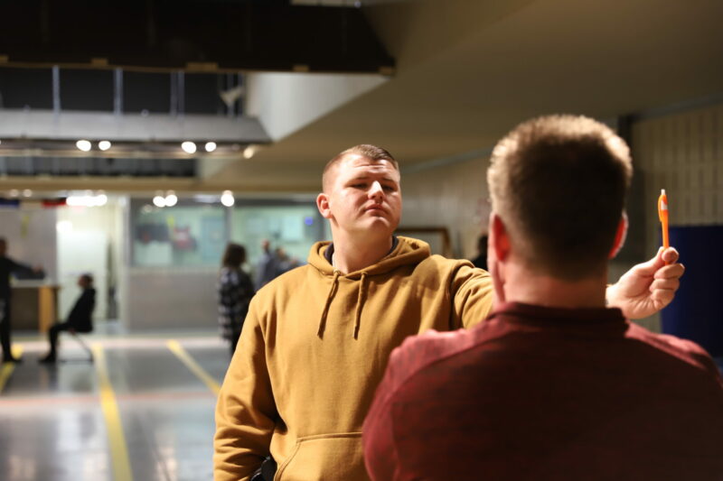 Basic Police Academy cadet administering sobriety testing in a simulation at Butler Tech