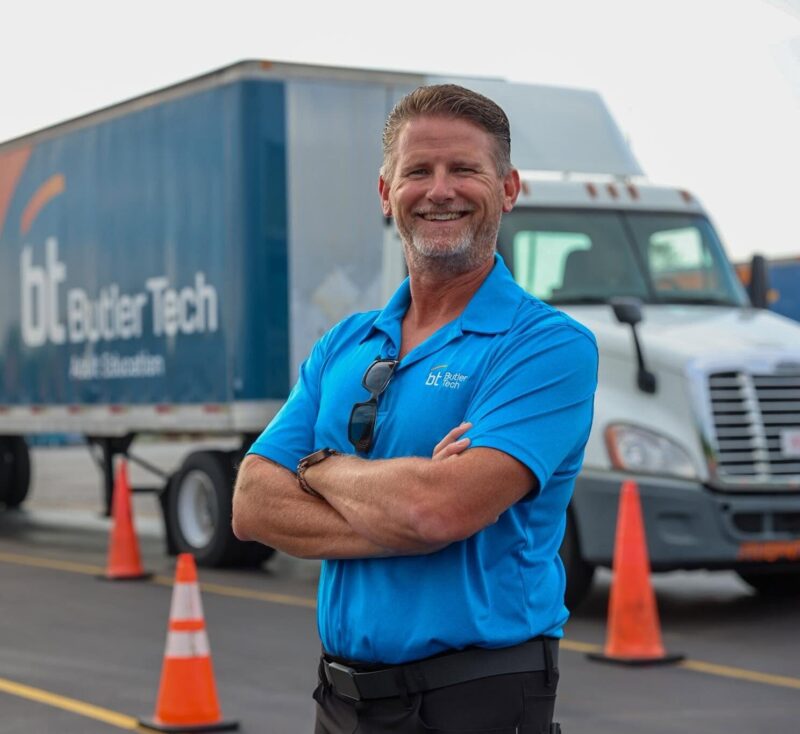 Jim Miller, wearing a blue 